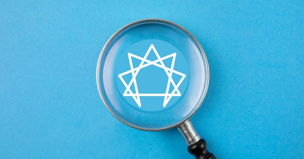 enneagram logo under a magnifying glass