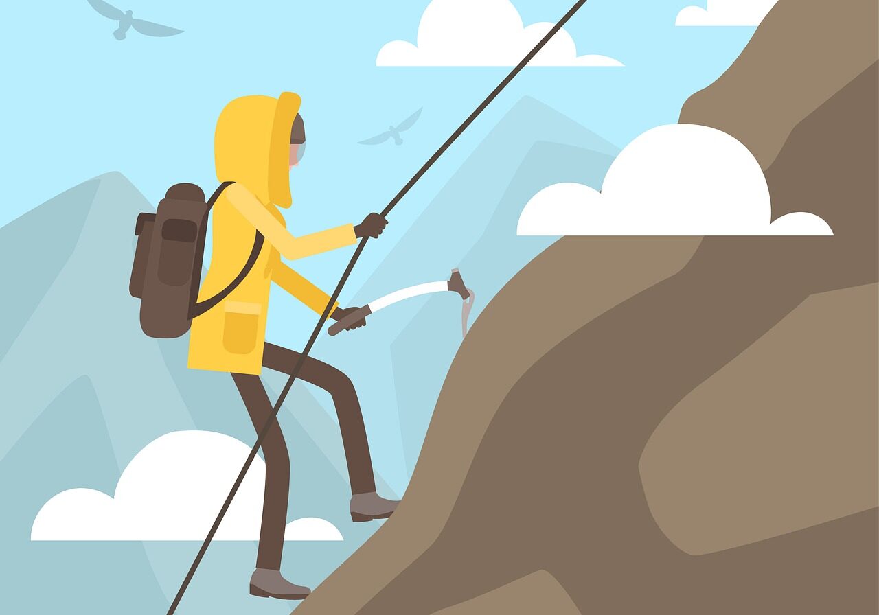 A flat color illustration of a person in a yellow parka climbing a mountain with mountain-climbing gear while birds fly in the background