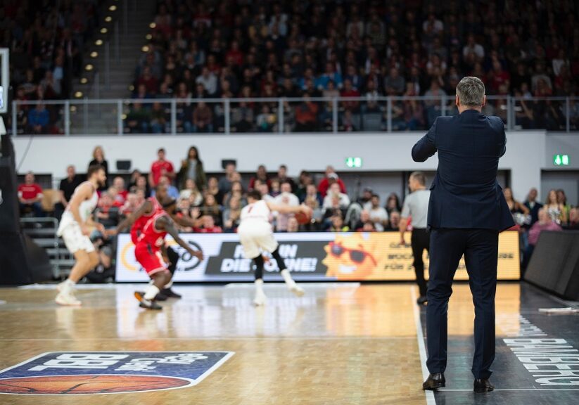 basketball coach coaching his team