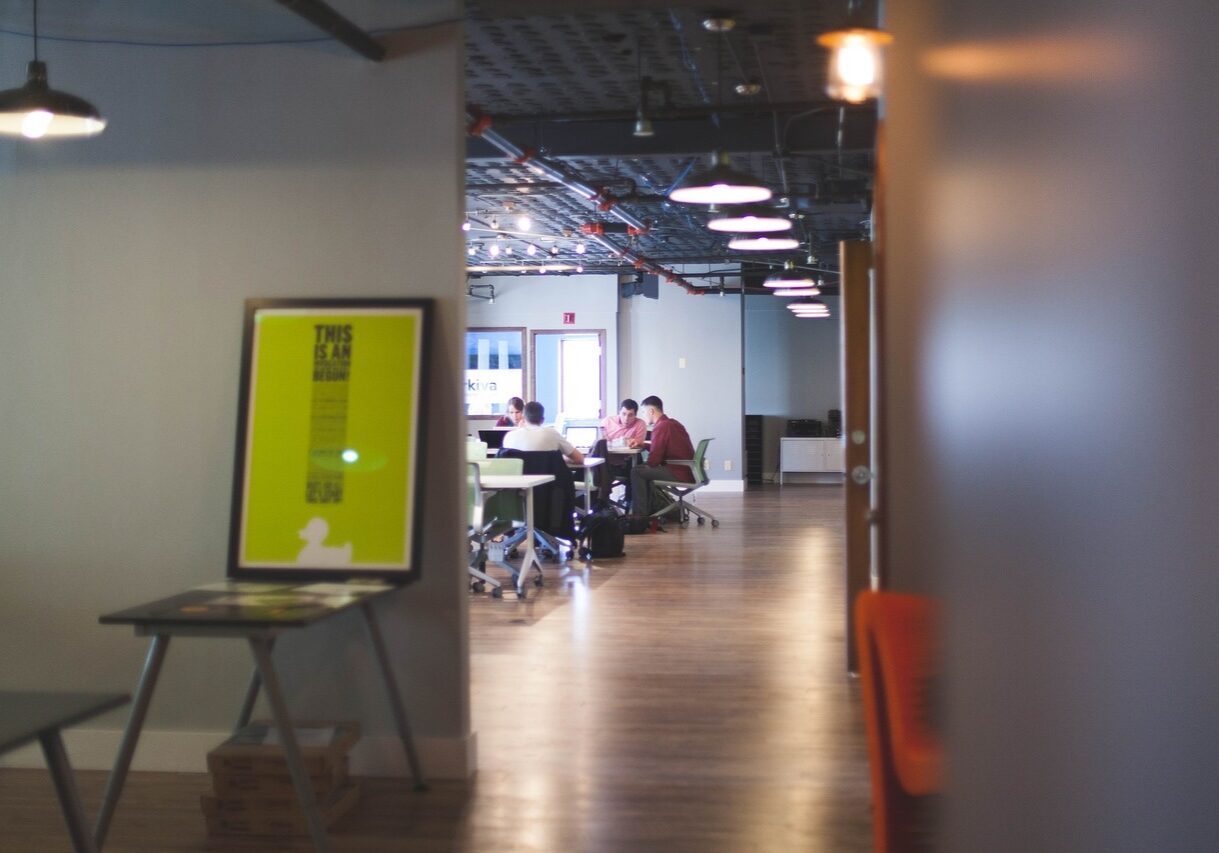 a team of young workers in a modern office collaborating in an open workspace