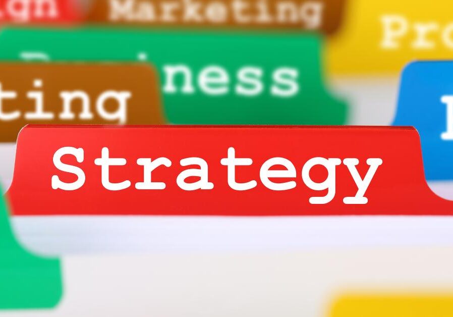 brightly colored file folder label that reads strategy